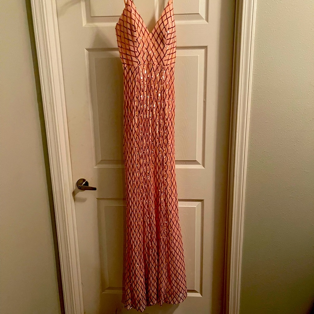 Beautiful soft pink and sequin prom dress. Never worn.